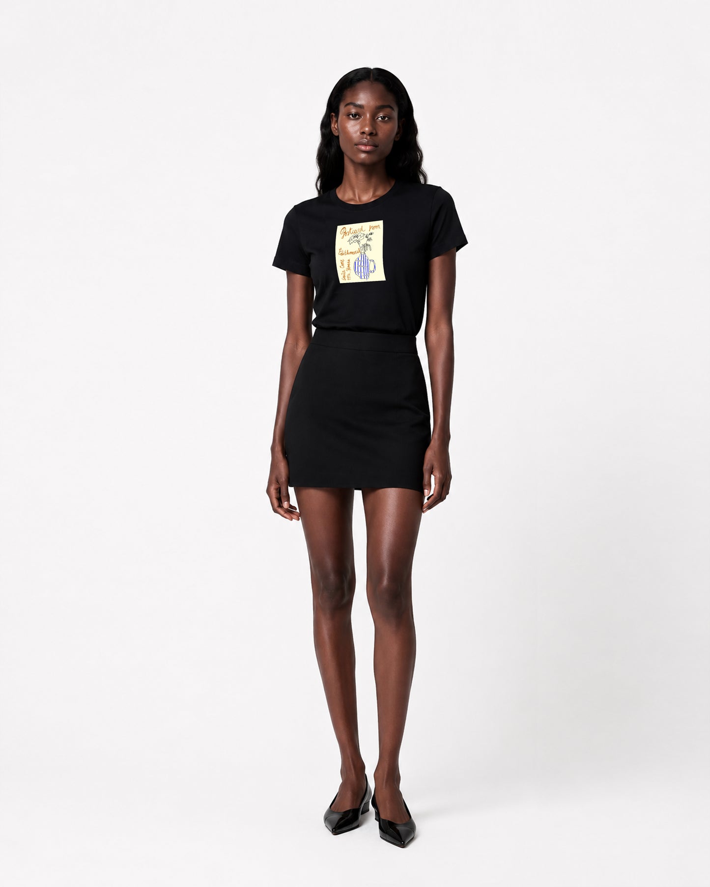 T-SHIRT NERA STAMPA CARTOLINA